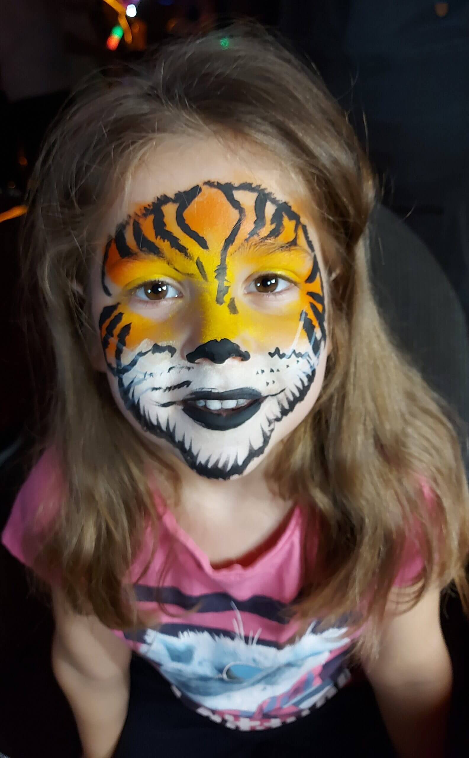 Tiger face painting at a Vancouver children festival