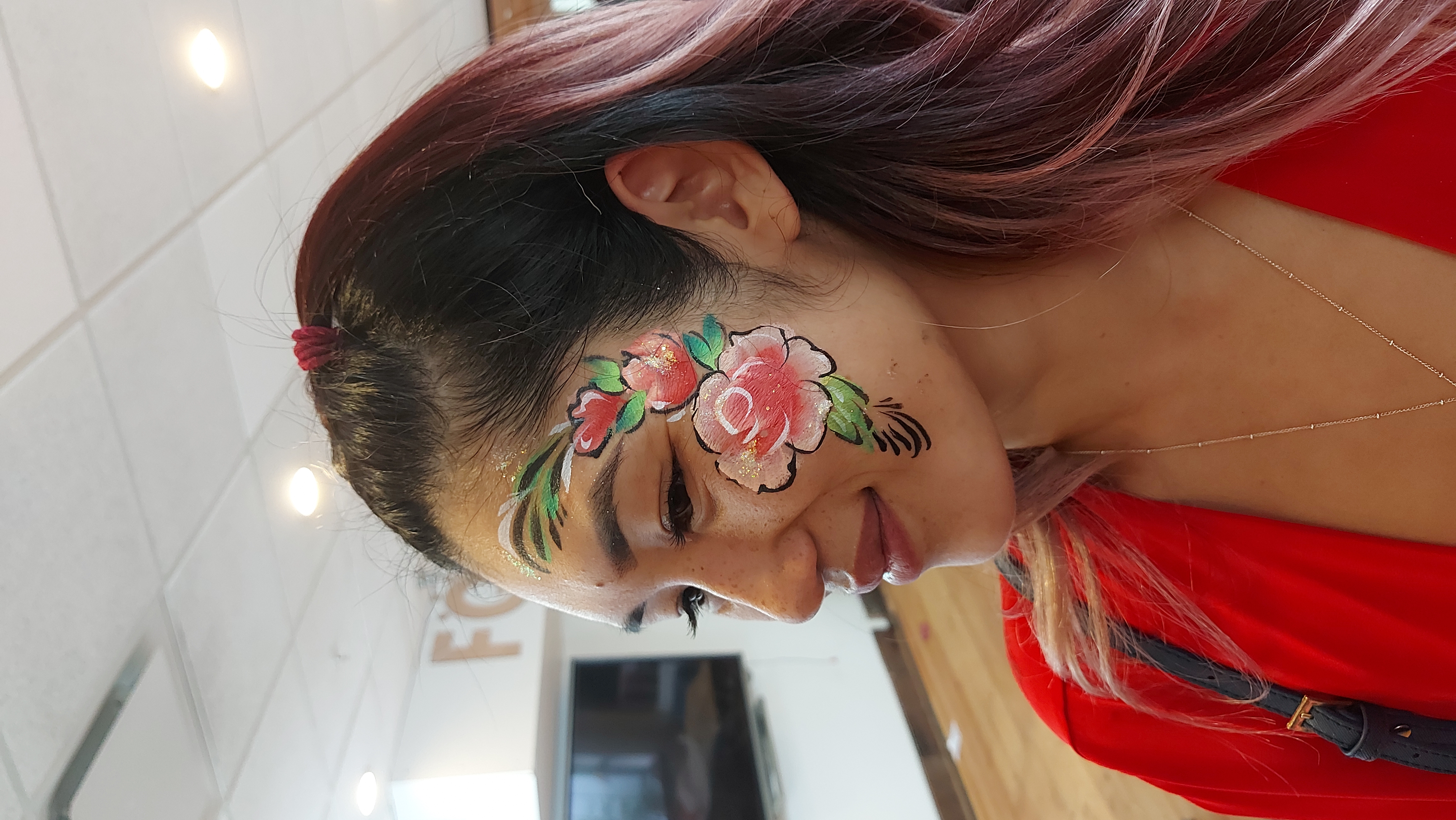 Rose garland face painting at a Vancouver rave