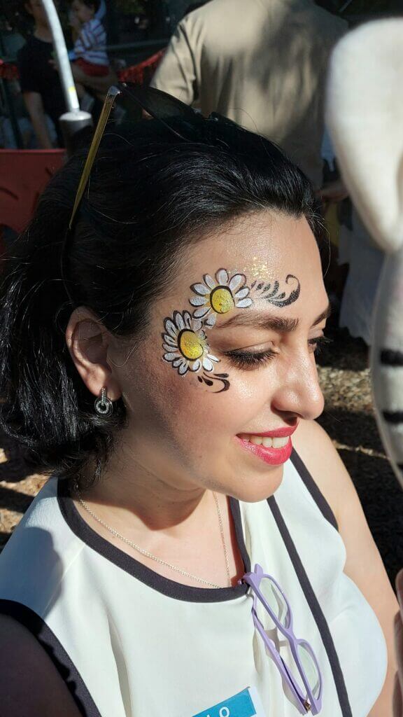 Daisies face painting at a Vancouver block party
