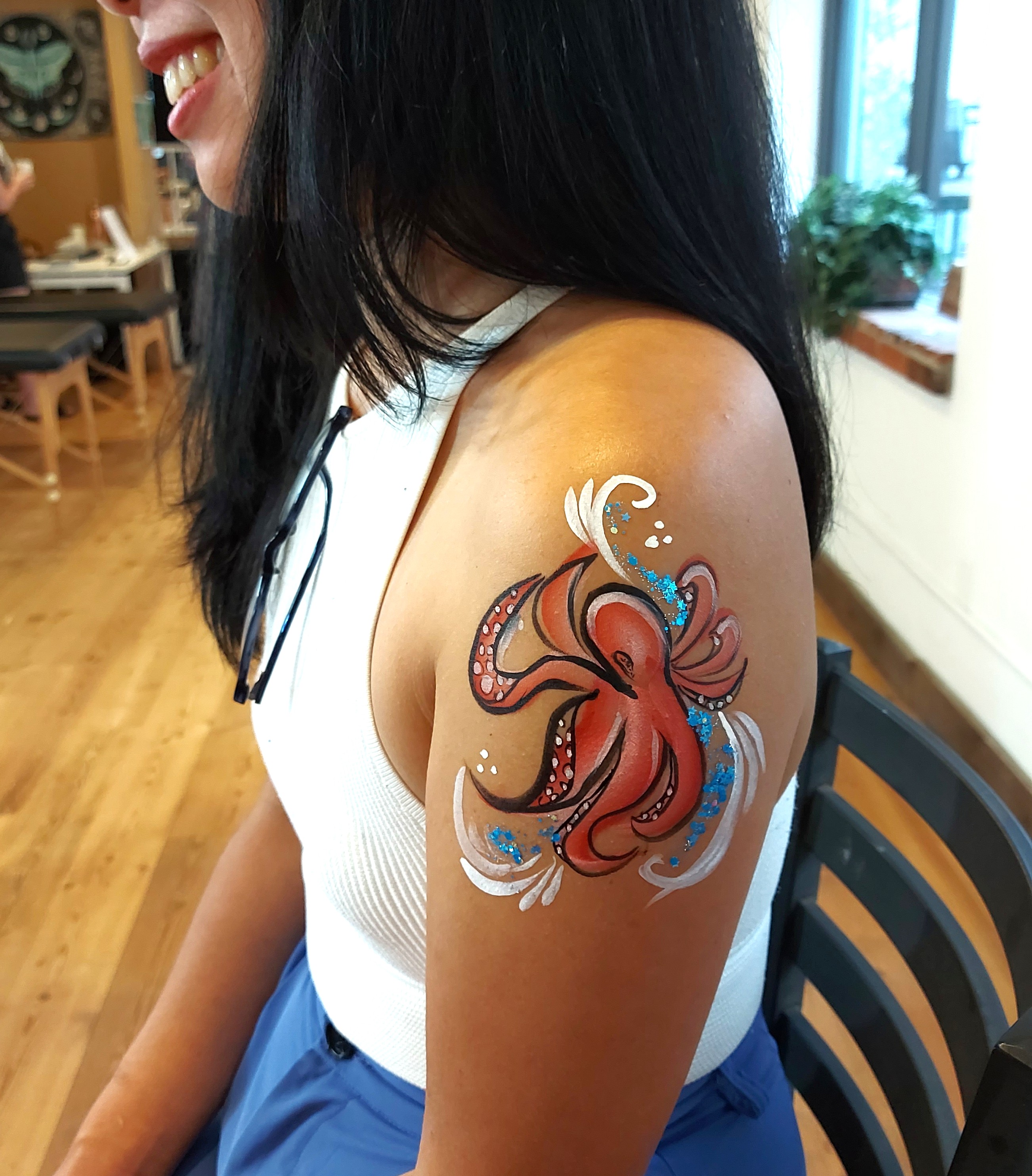 Octopus arm painting at a Vancouver rave