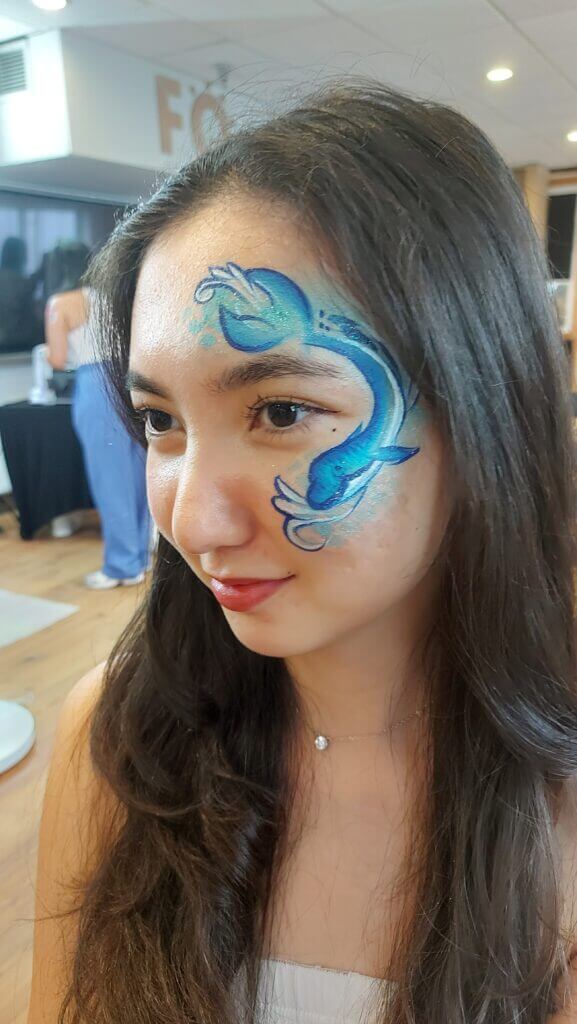 Dolphin face painting at a Vancouver rave